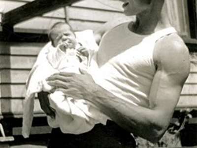 A man holding baby