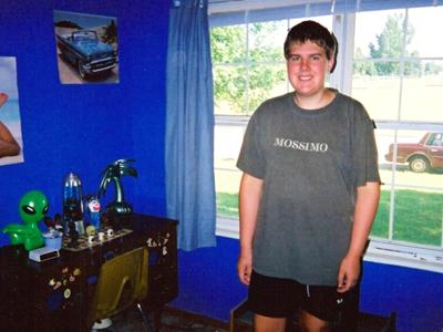 a man standing in front of a window