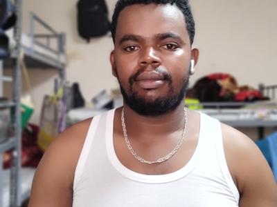 a person smiling for the camera