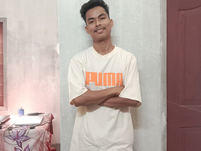 a man standing in front of a building