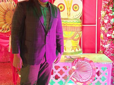 a person standing in front of car