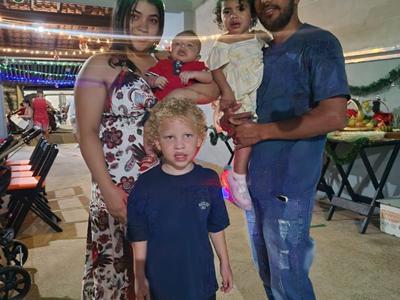 a group of people standing in a room