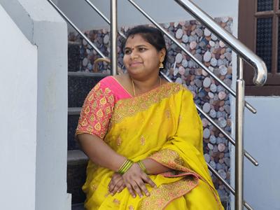 Replace the background with a garden full of blooming flowers, sunlight, and gentle green tones. It creates a bright, joyful, and lively image.