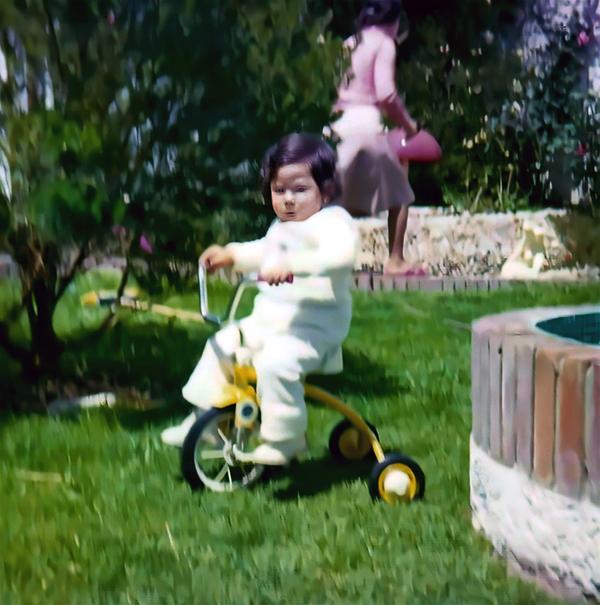 Child in a tricycle