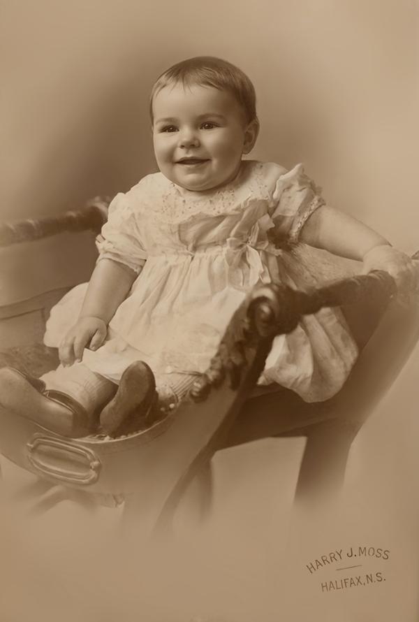 Totally restoration of baby  portrait 