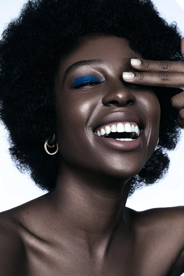Studio Portrait of a Smiling Woman
